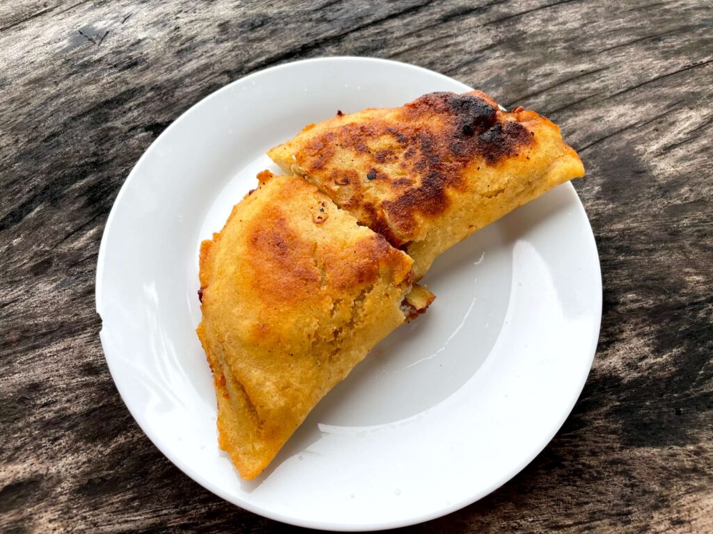 Fried empanada made with corn dough