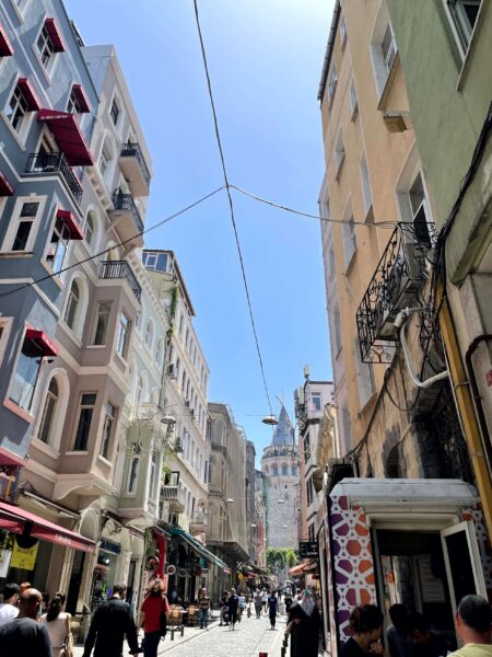 Istanbul - Colourful Street in Beyoğlu with Galata Tower at the end
