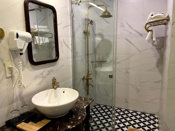 The ensuite bathroom on Athena Royal Cruise