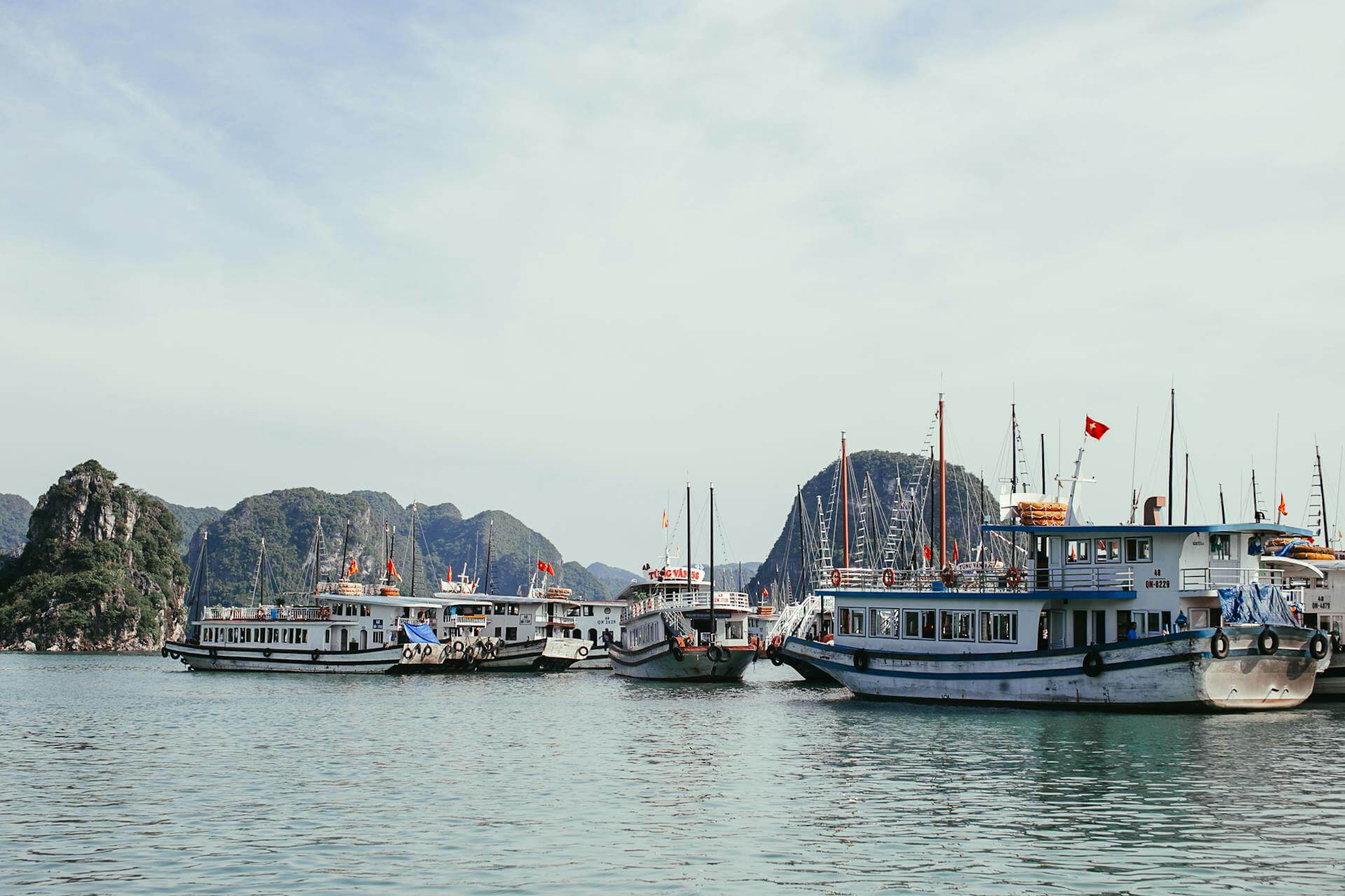 Traditional wooden junk boats in Halong Bay